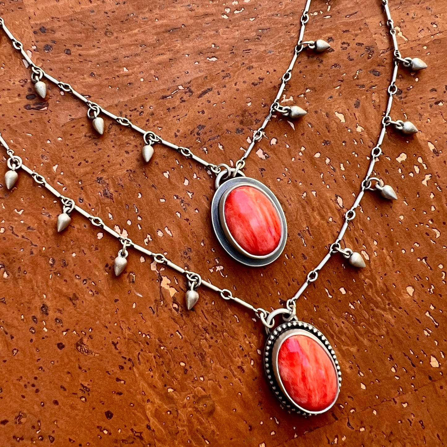 Red spiny oyster shell raindrop necklace (A,B)