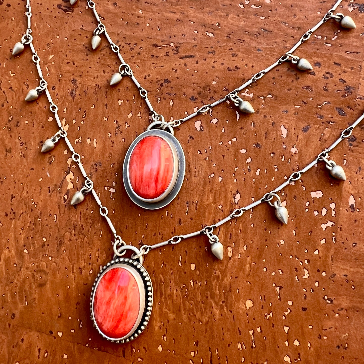 Red spiny oyster shell raindrop necklace (A,B)