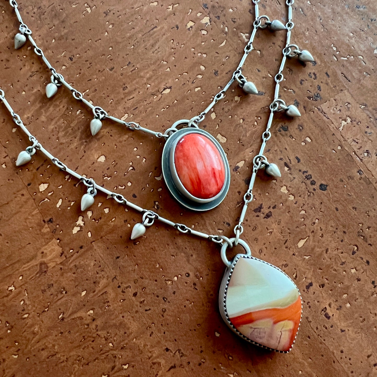 Red spiny oyster shell raindrop necklace (A,B)