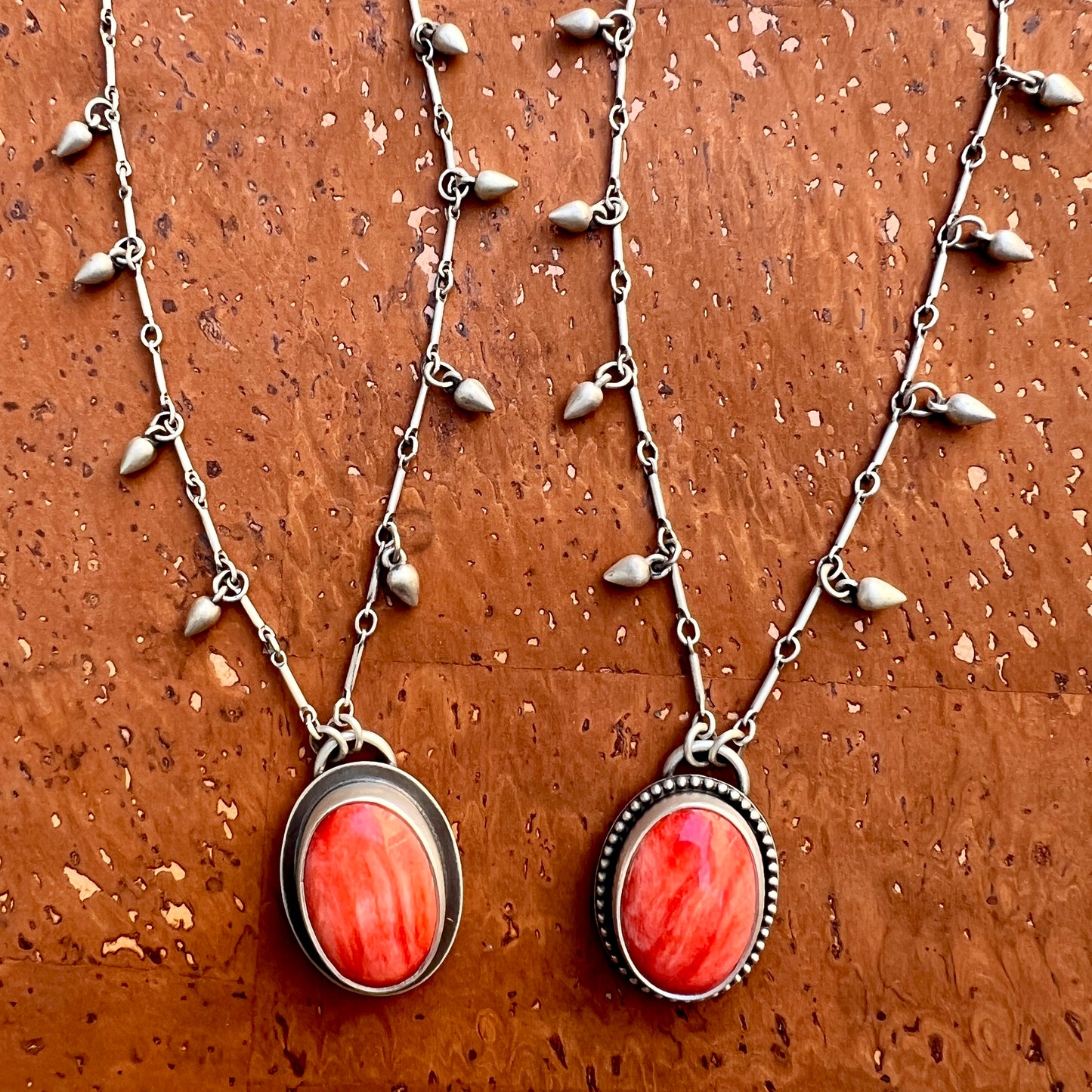 Red spiny oyster shell raindrop necklace (A,B)
