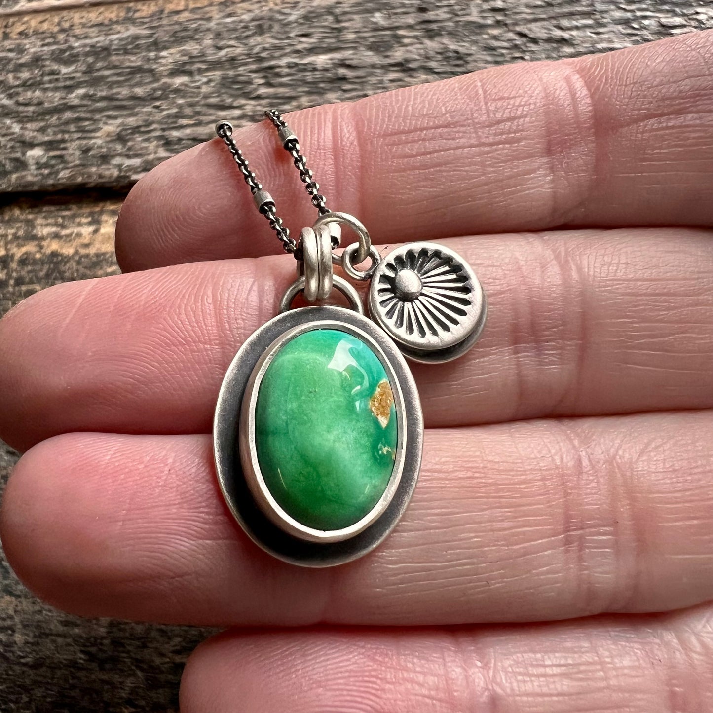 Emerald Valley turquoise and hand stamped sunburst charm necklace