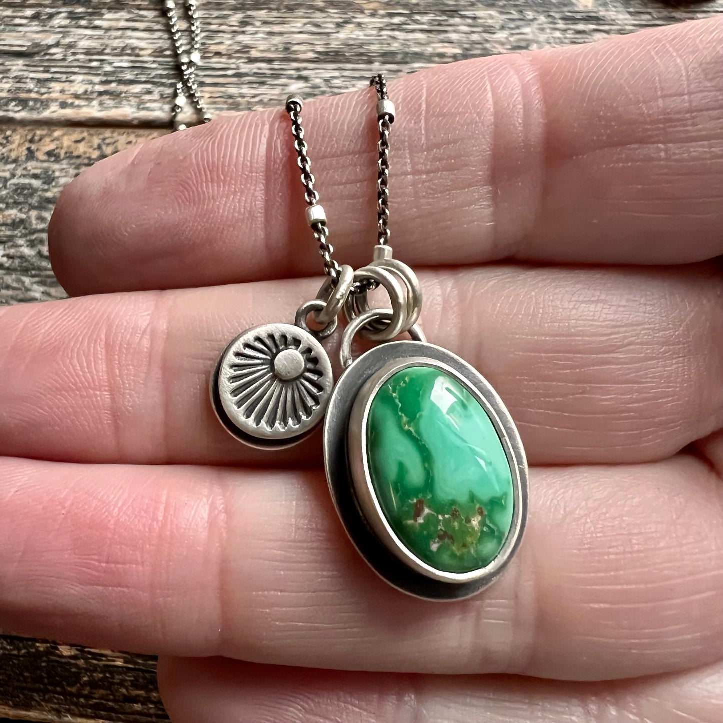 Emerald Valley turquoise and hand stamped sunburst charm necklace