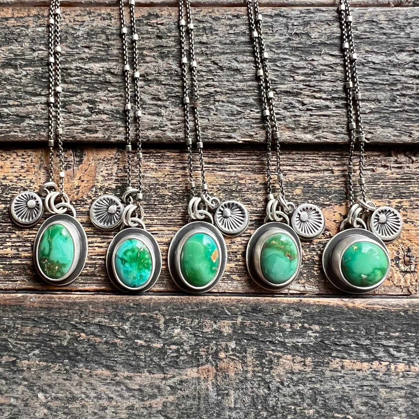 Emerald Valley turquoise and hand stamped sunburst charm necklace