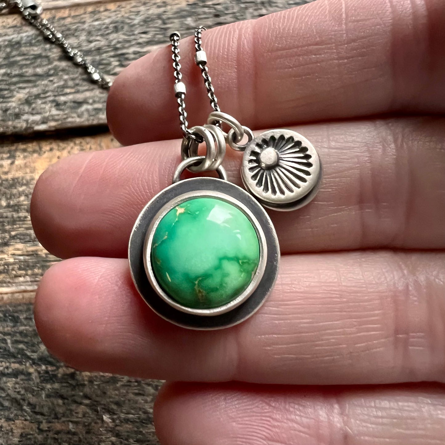 Emerald Valley turquoise and hand stamped sunburst charm necklace