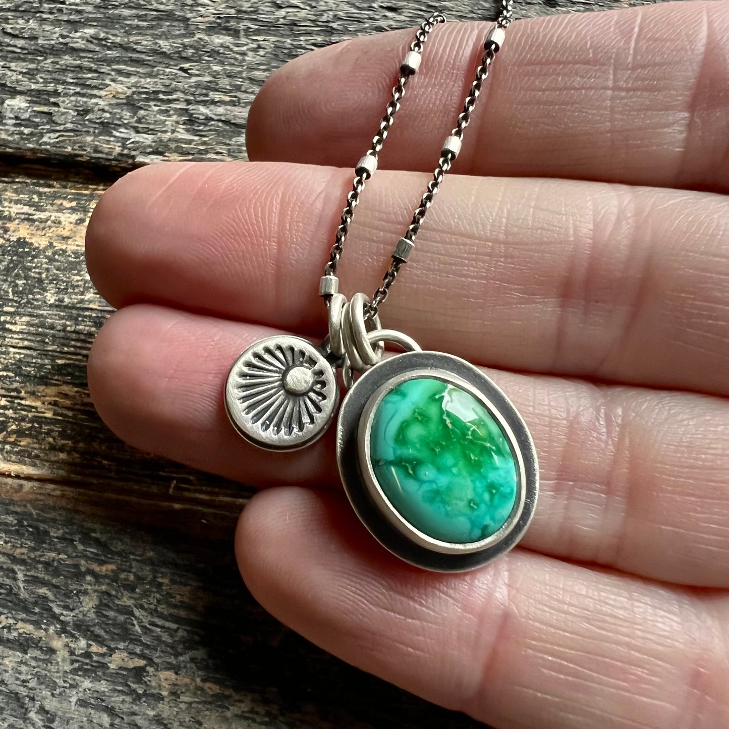 Emerald Valley turquoise and hand stamped sunburst charm necklace